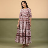 Front View of a Model wearing Taupe Shibori Tie-Dye Cotton Ankle Length Tier Bohemian Dress