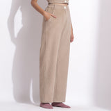 Right View of a Model wearing Beige Corduroy Wide-Legged Trouser Pant