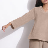 Front Detail of a Model wearing Taupe Beige Cotton Corduroy V-Neck Top