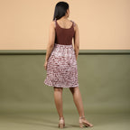 Back View of a Model wearing Taupe Shibori Tie-Dye Cotton Gathered Short Dress