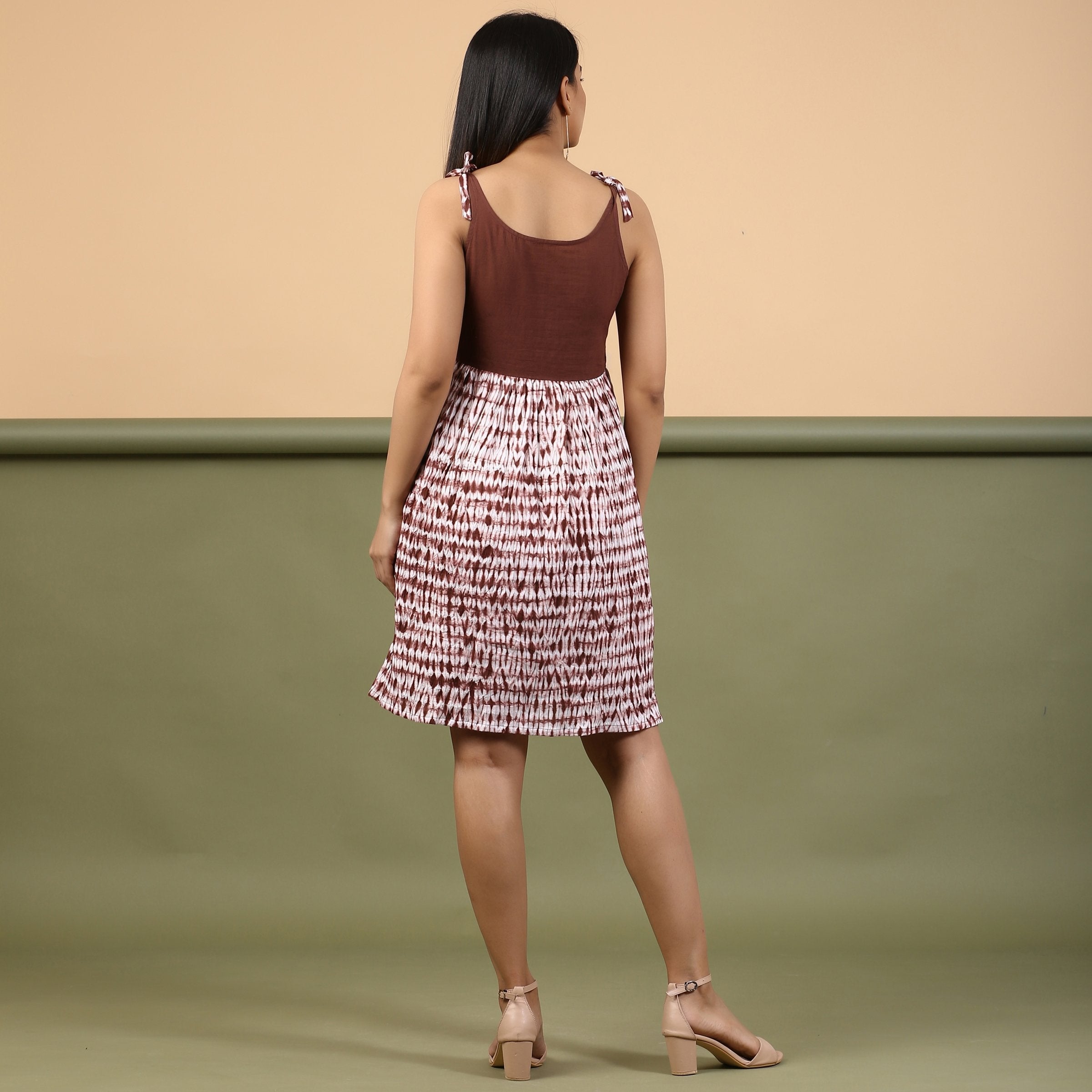 Back View of a Model wearing Taupe Shibori Tie-Dye Cotton Gathered Short Dress
