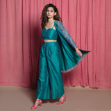 Left View of a Model wearing Teal Cotton Chanderi Block Printed Knee Length Overlay