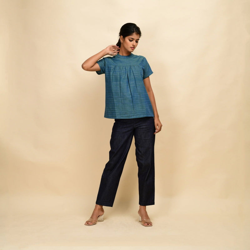 Front View of a Model wearing Teal Handspun Cotton Relaxed Fit Gathered Top