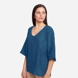 Left View of a Model wearing Teal Loose Fit Drop Shoulder Top