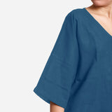 Front Detail of a Model wearing Teal Loose Fit Drop Shoulder Top