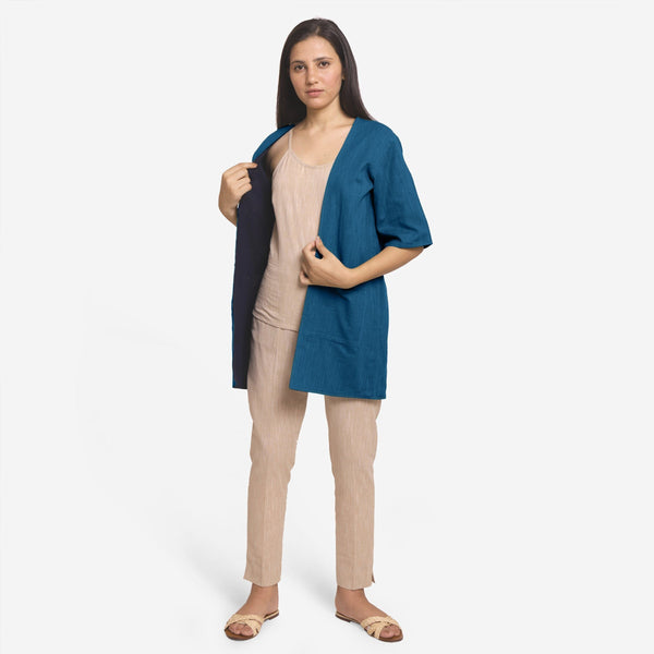 Front View of a Model wearing Teal Reversible Cotton Flax Front Open Overlay