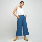 Front View of a Model wearing Teal Wide Legged Straight Pant