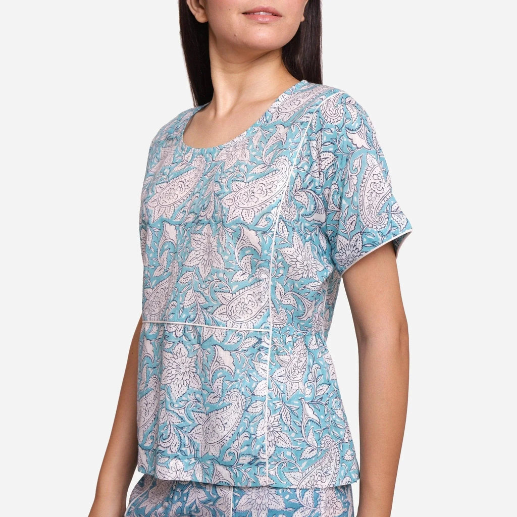 Front Detail of a Model wearing Turquoise Paisley Cotton Block Print Top