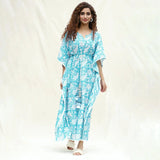 Front View of a Model wearing Turquoise Floral Block Printed Cotton Ankle Length Kaftan Dress