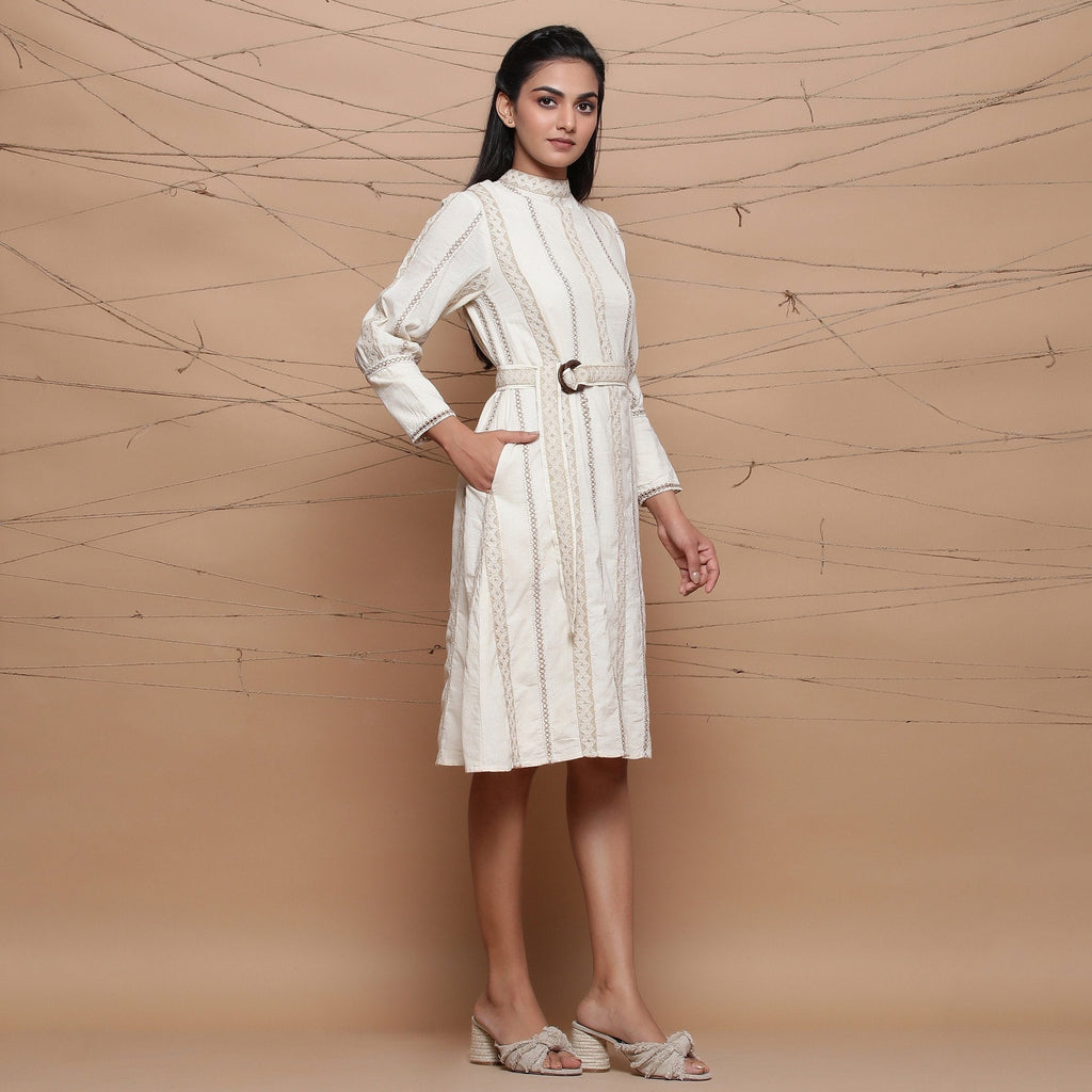 Right View of a Model wearing Undyed Jute Laced Turtle Neck Dress