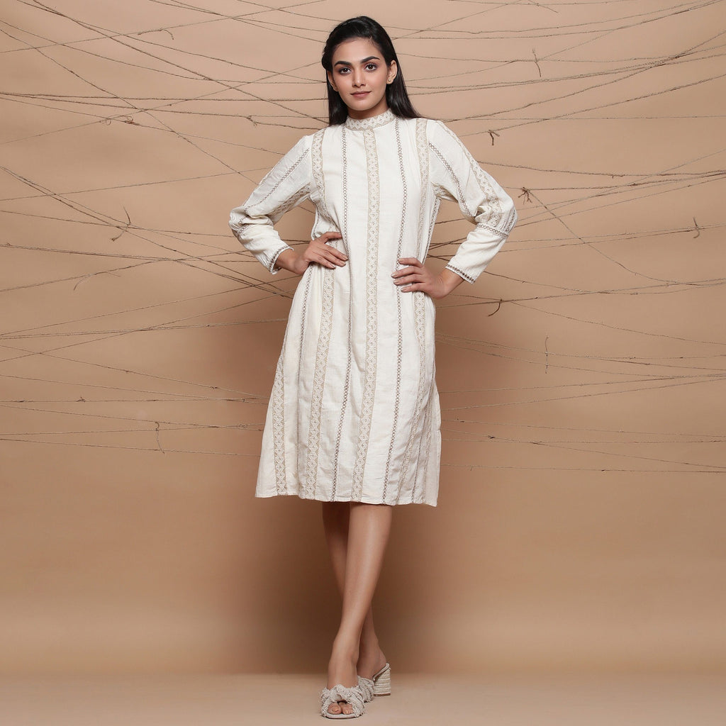 Front View of a Model wearing Undyed Jute Laced Turtle Neck Dress