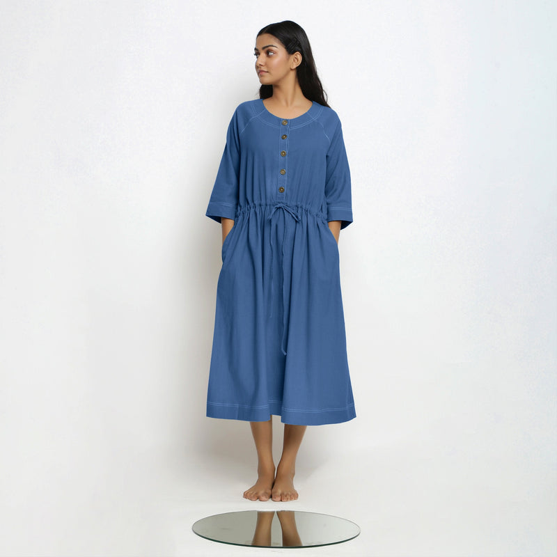 Front View of a Model wearing Vegetable-Dyed Blue 100% Cotton Button-Down Dress