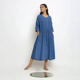 Front View of a Model wearing Vegetable-Dyed Blue 100% Cotton Button-Down Dress