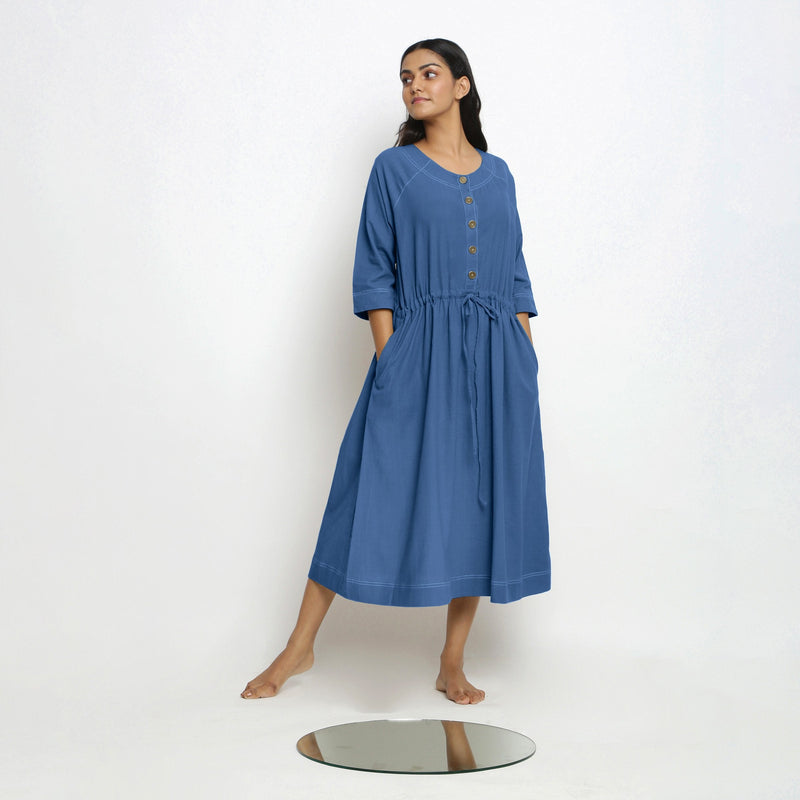 Front View of a Model wearing Vegetable-Dyed Blue 100% Cotton Button-Down Dress