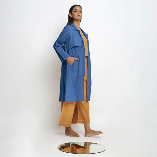 Right View of a Model wearing Vegetable Dyed Blue Paneled Cotton Overlay