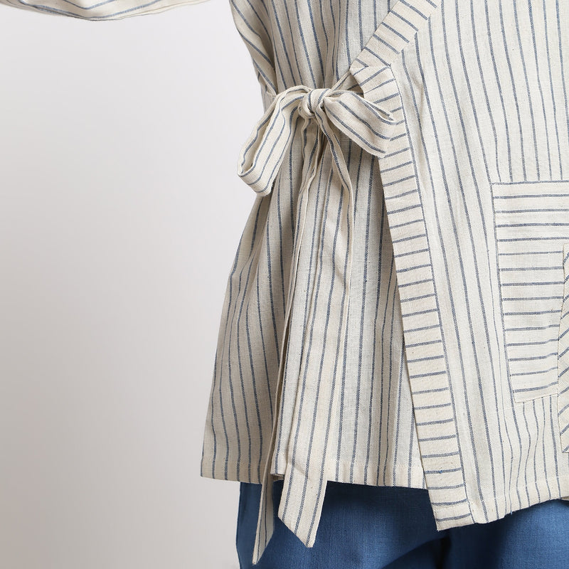 Front Detail of a Model wearing Off-White and Blue Striped Handspun Cotton Asymmetrical V-Neck Outerwear