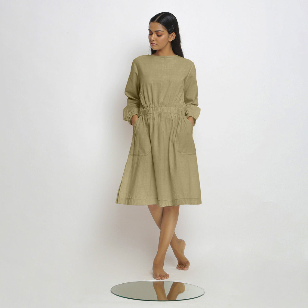 Front View of a Model wearing Vegetable-Dyed Green 100% Cotton Dress