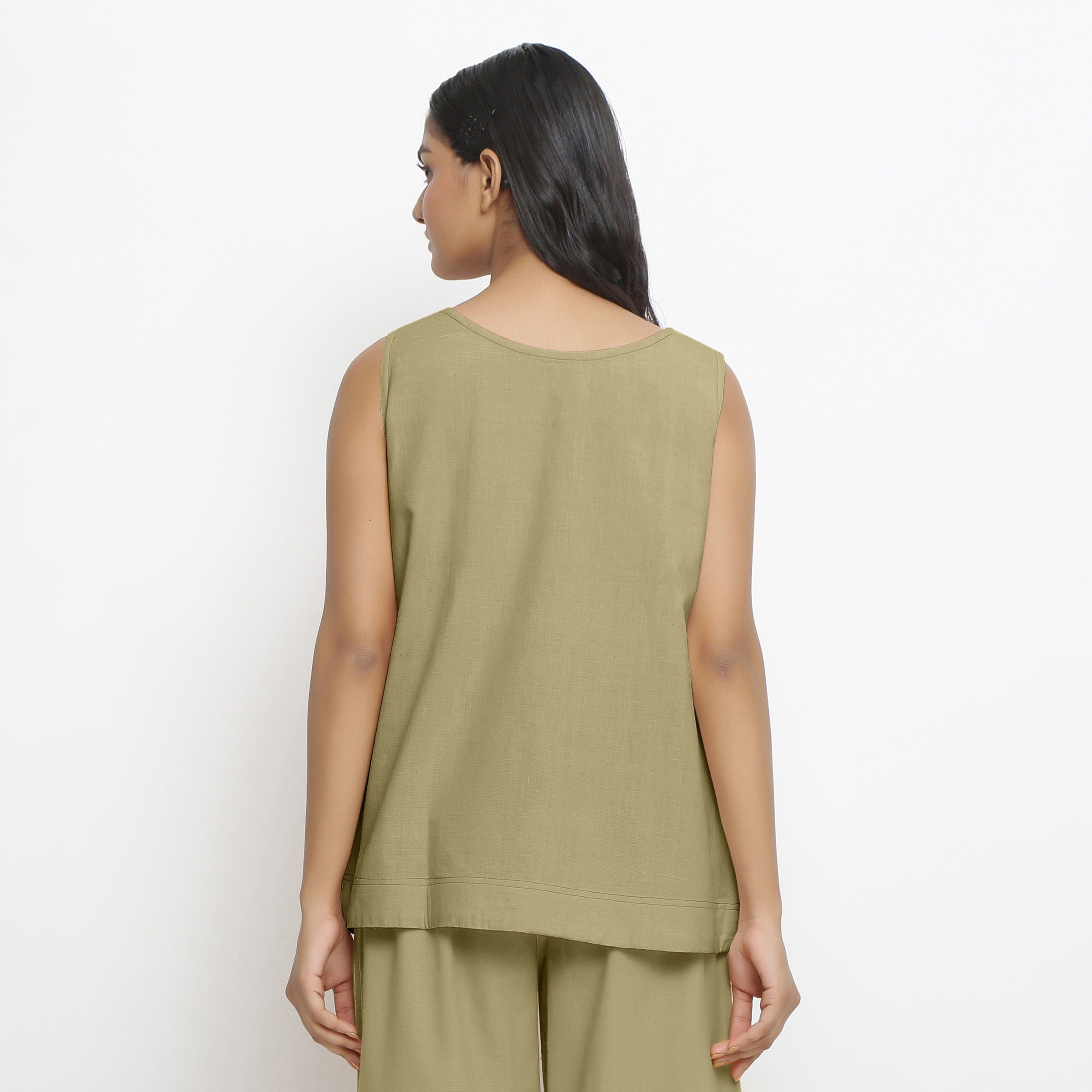 Back View of a Model wearing Vegetable Dyed Handspun Green A-Line Top