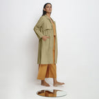 Right View of a Model wearing Vegetable-Dyed Khaki Green 100% Cotton Paneled Overlay