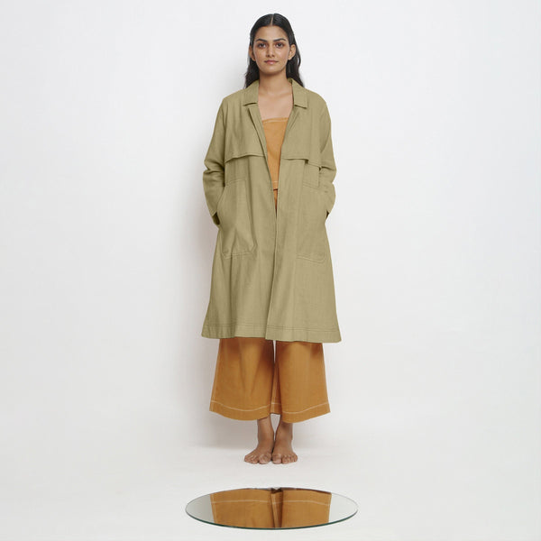 Front View of a Model wearing Vegetable-Dyed Khaki Green 100% Cotton Paneled Overlay