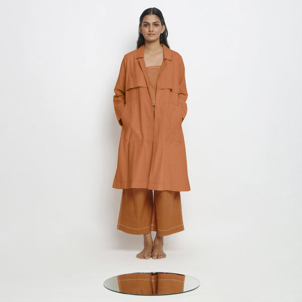 Front View of a Model wearing Vegetable-Dyed Khaki Orange 100% Cotton Paneled Overlay