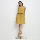 Front View of a Model wearing Vegetable-Dyed Light Yellow 100% Cotton Mid-Rise Skirt