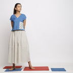 Front View of a Model wearing Off-White and Blue Striped Yarn Dyed Cotton Gathered Maxi Skirt