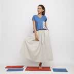 Front View of a Model wearing Off-White and Blue Striped Yarn Dyed Cotton Gathered Maxi Skirt