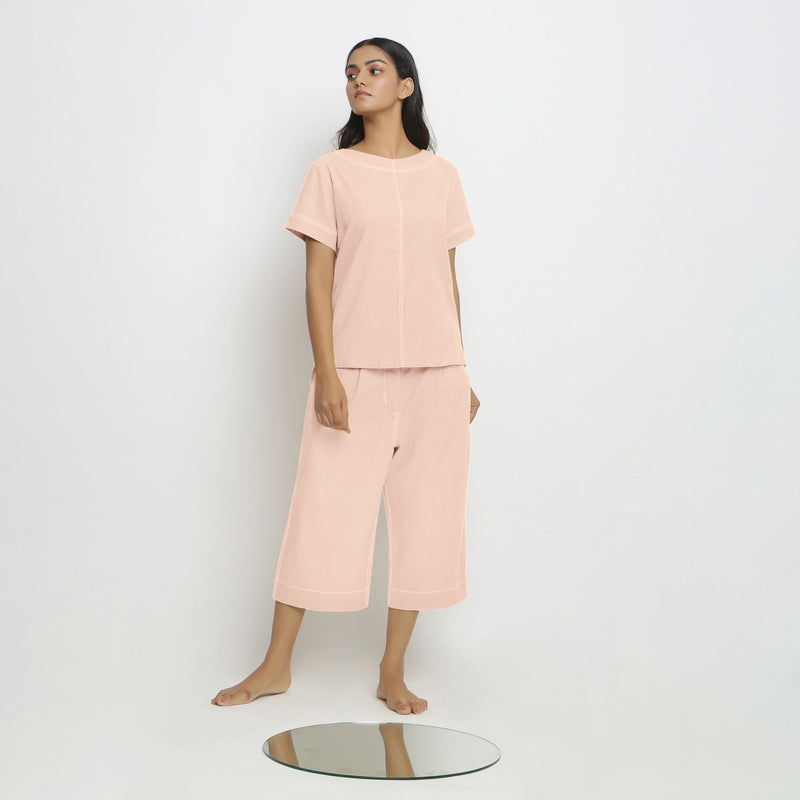 Front View of a Model wearing Vegetable-Dyed Pink 100% Cotton Paneled Top