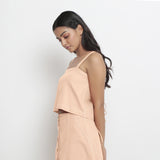 Left View of a Model wearing Vegetable-Dyed Pink 100% Cotton Spaghetti Top