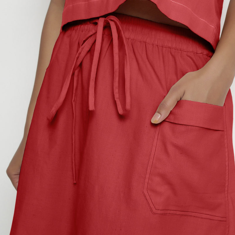 Front Detail of a Model wearing Vegetable-Dyed Red 100% Cotton Mid-Rise Skirt