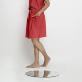 Left View of a Model wearing Vegetable-Dyed Red 100% Cotton Mid-Rise Skirt