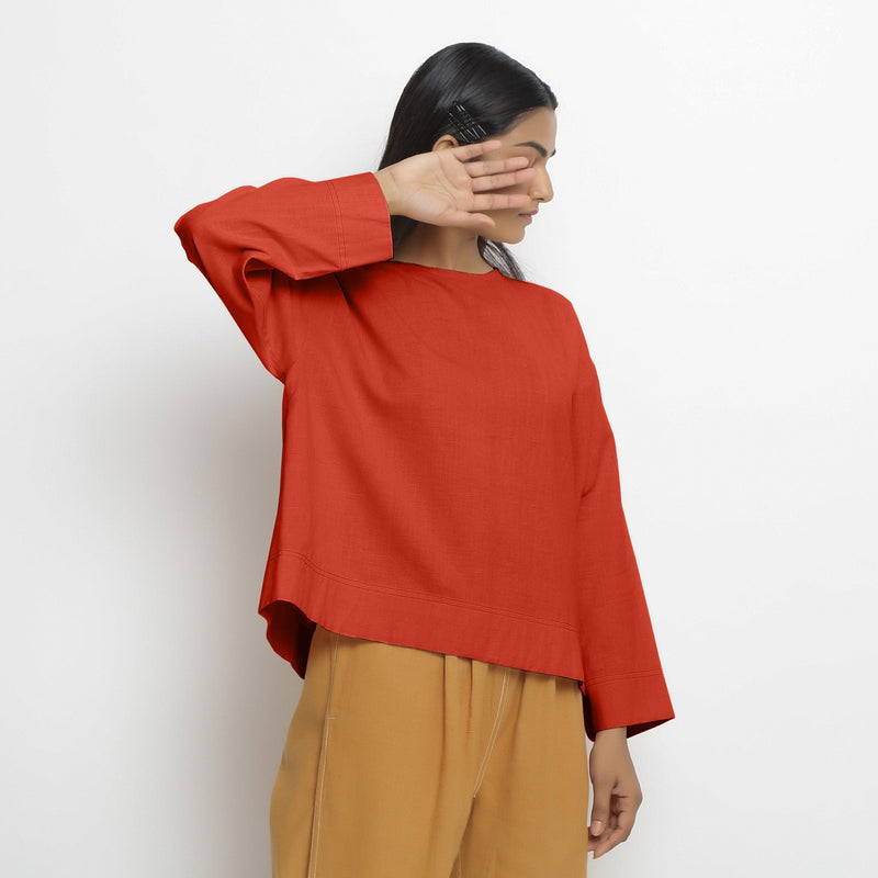 Right View of a Model wearing Vegetable-Dyed Red 100% Cotton Straight Top