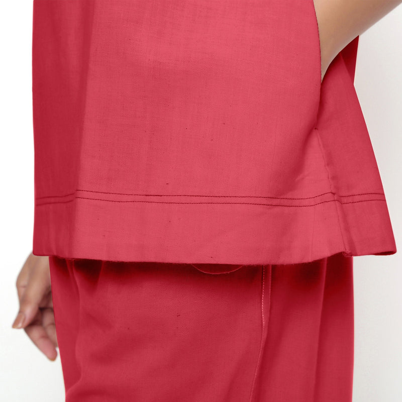 Close View of a Model wearing Vegetable Dyed Red Boat Neck A-Line Top