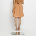 Back View of a Model wearing Vegetable-Dyed Rust 100% Cotton Mid-Rise Skirt