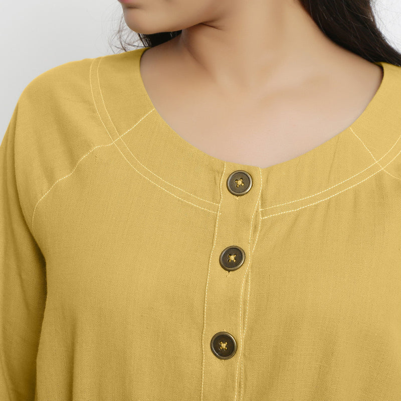 Front Detail of a Model wearing Vegetable-Dyed Yellow 100% Cotton Button-Down Dress