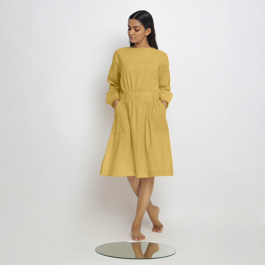 Front View of a Model wearing Vegetable-Dyed Yellow 100% Cotton Dress