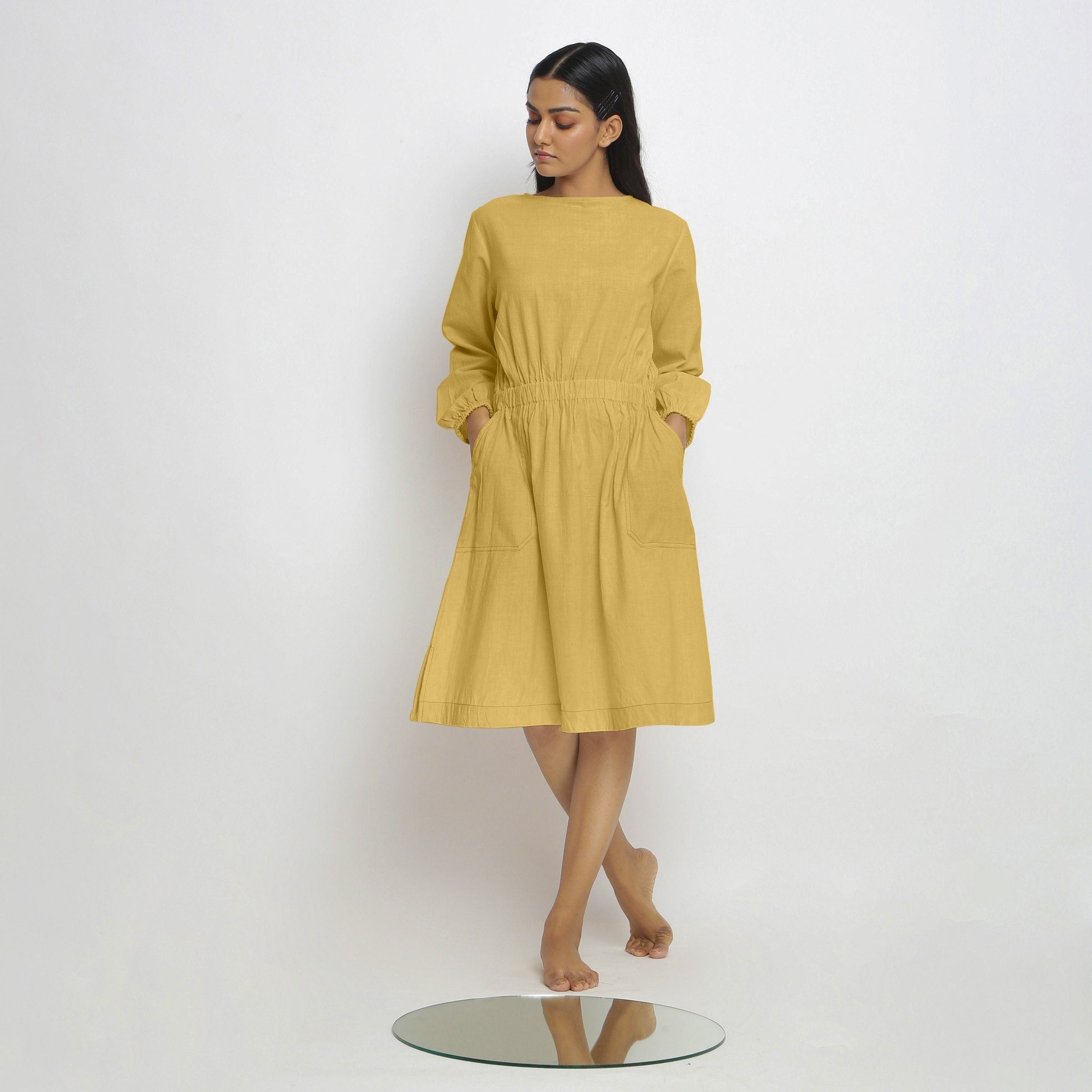 Front View of a Model wearing Vegetable-Dyed Yellow 100% Cotton Dress