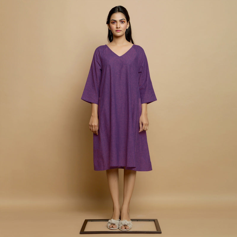 Front View of a Model wearing Violet Flared Knee Length Cotton Dress