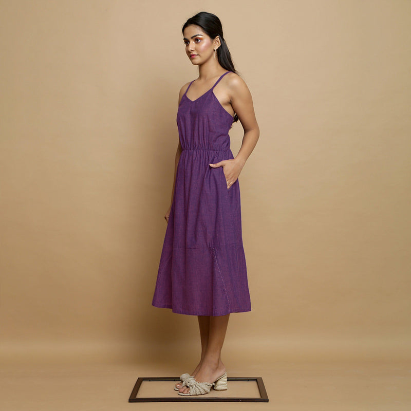 Left View of a Model wearing Violet Handspun Cotton Midi Godet Dress