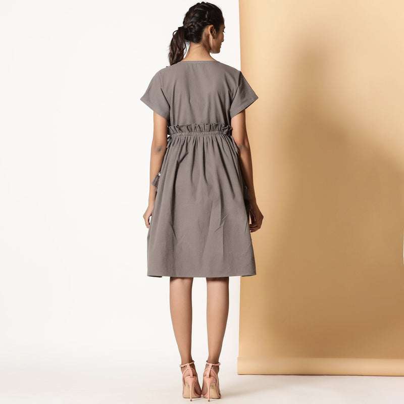 Back View of a Model wearing Ash Grey Warm Cotton Flannel Knee Length Frilled Dress