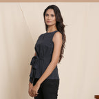 Left View of a Model wearing Moonlight Black Warm Cotton Flannel Sleeveless Tie-up Top