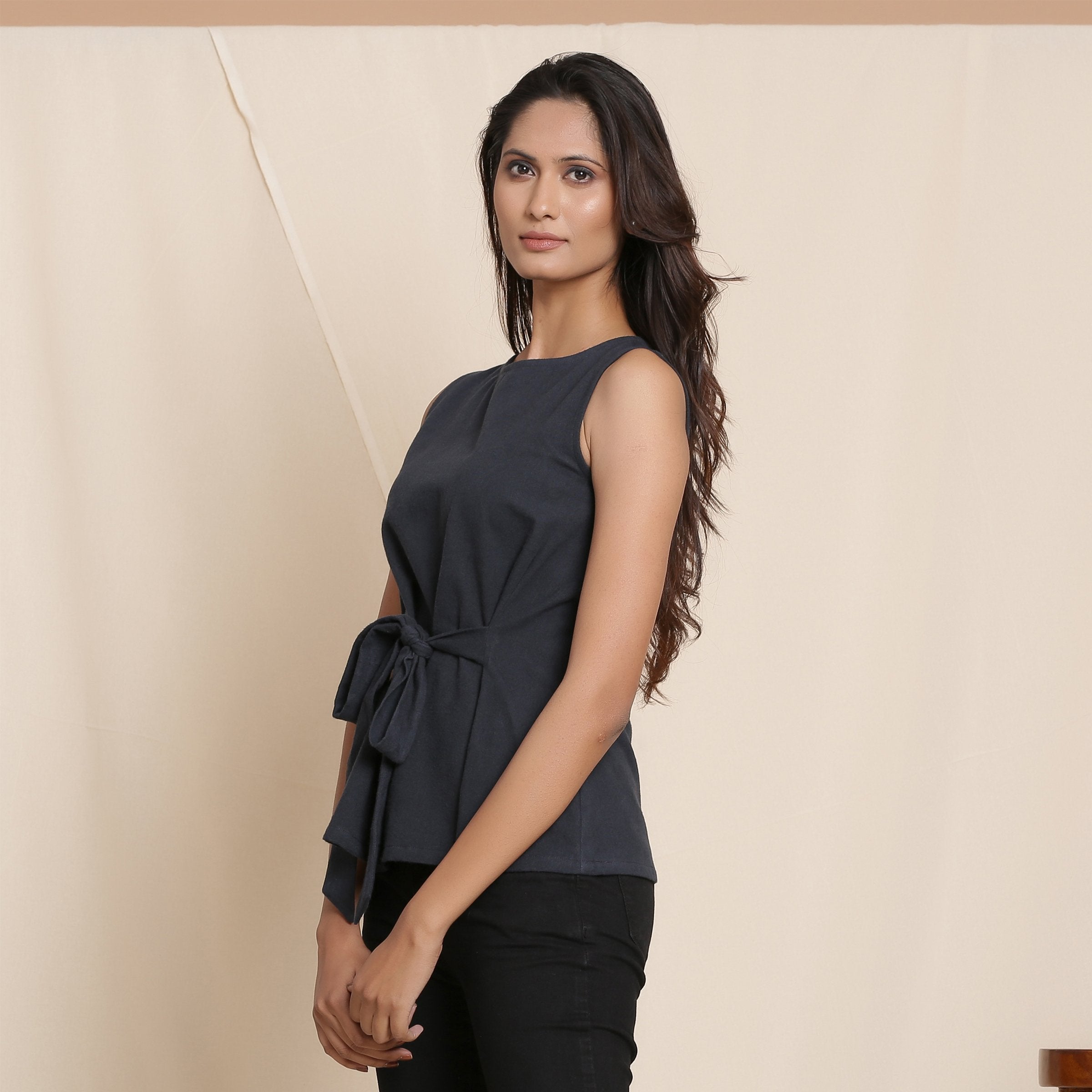 Left View of a Model wearing Moonlight Black Warm Cotton Flannel Sleeveless Tie-up Top