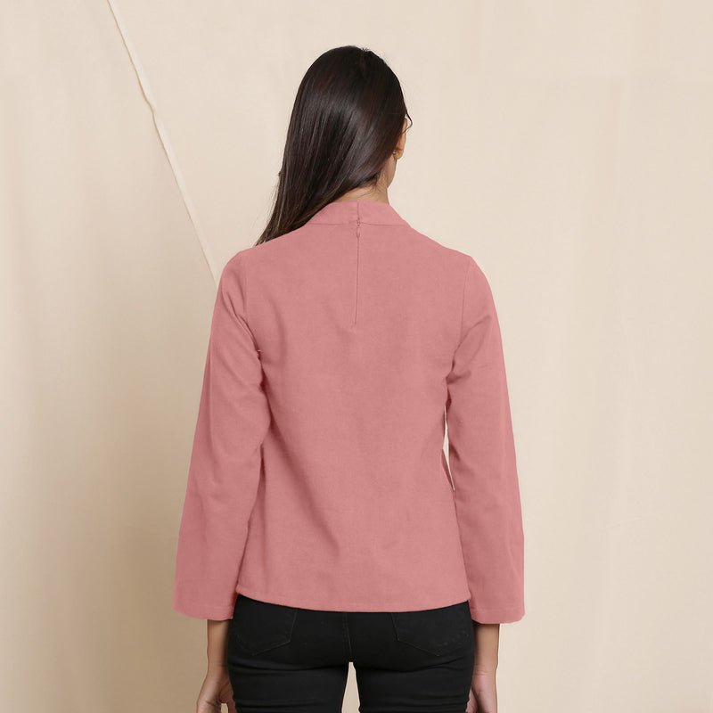 Back View of a Model wearing Warm English Rose Turtleneck Straight Top