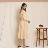 Back View of a Model wearing Warm Flannel Beige and Flare Dress