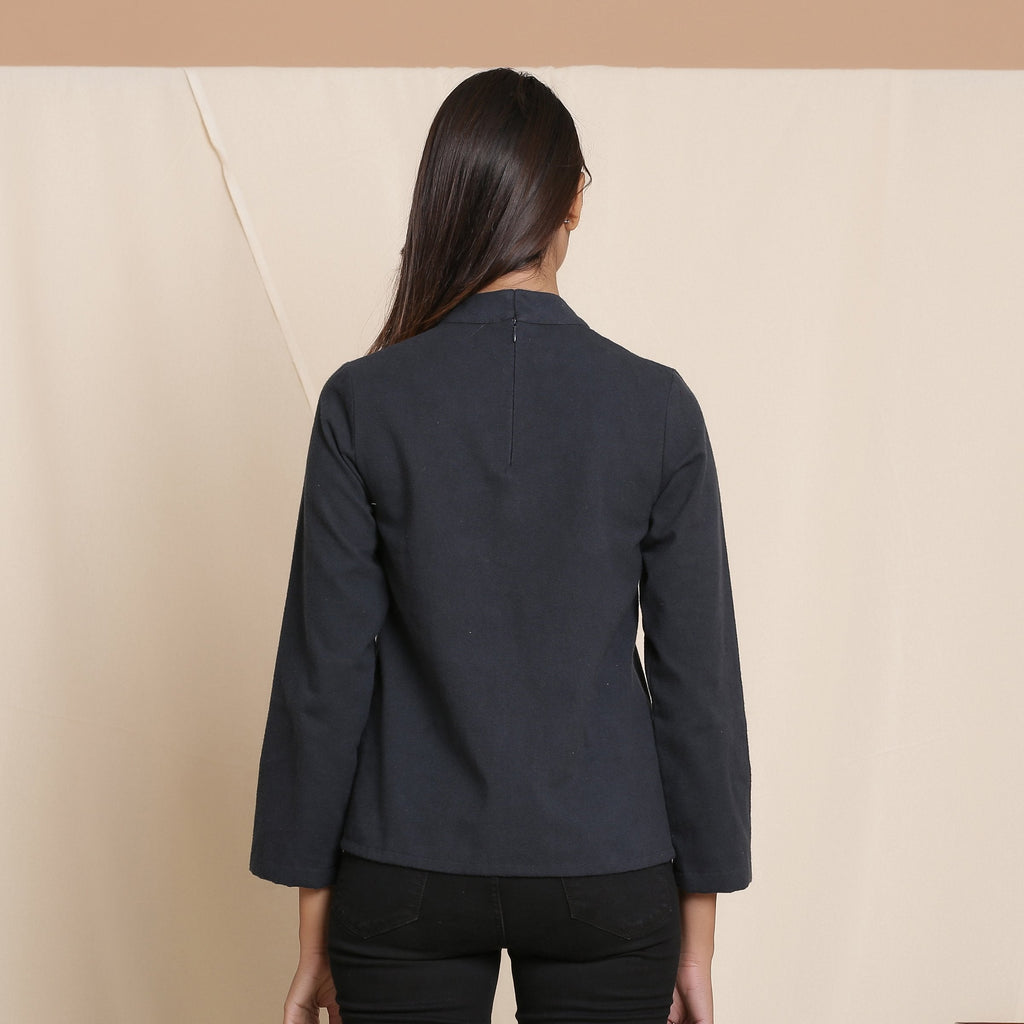 Back View of a Model wearing Moonlight Black Warm Cotton Flannel High Neck Top