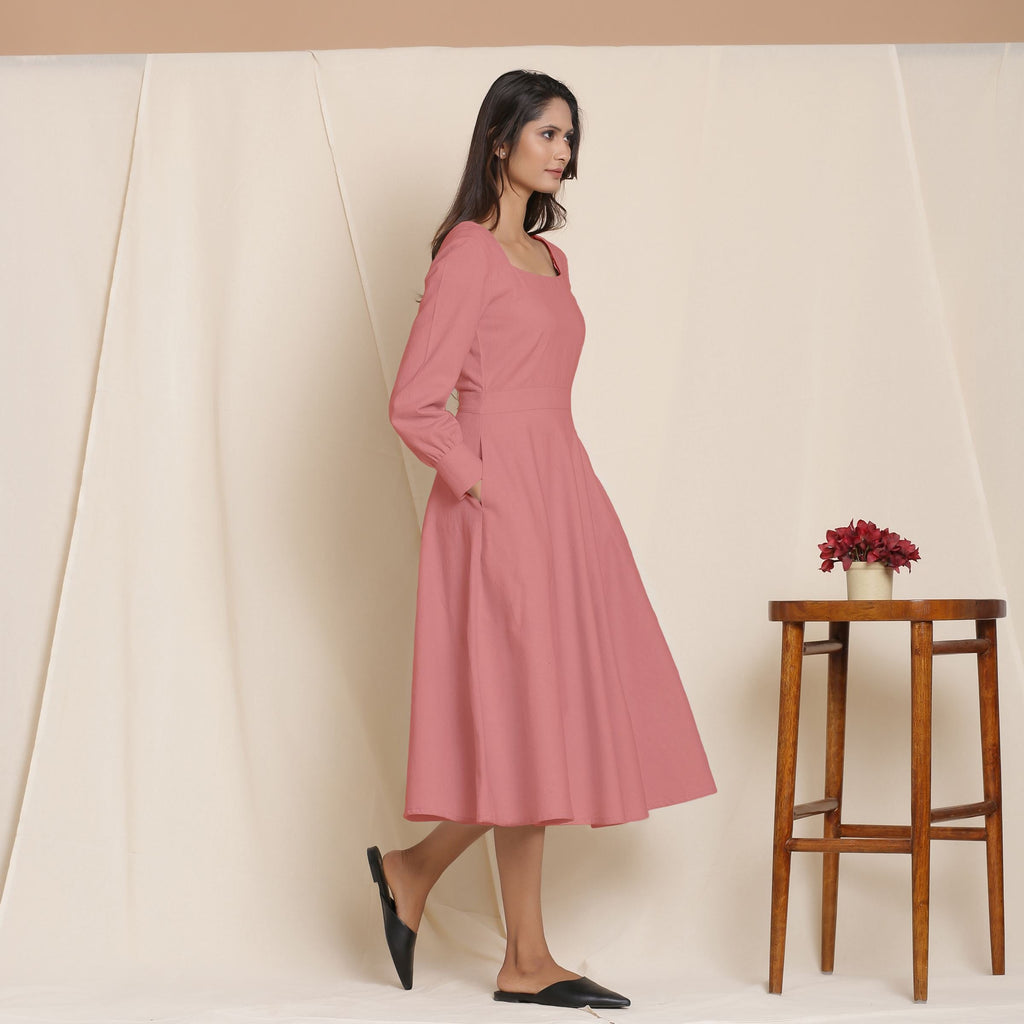 Right View of a Model wearing Warm Flannel Pink and Flare Dress