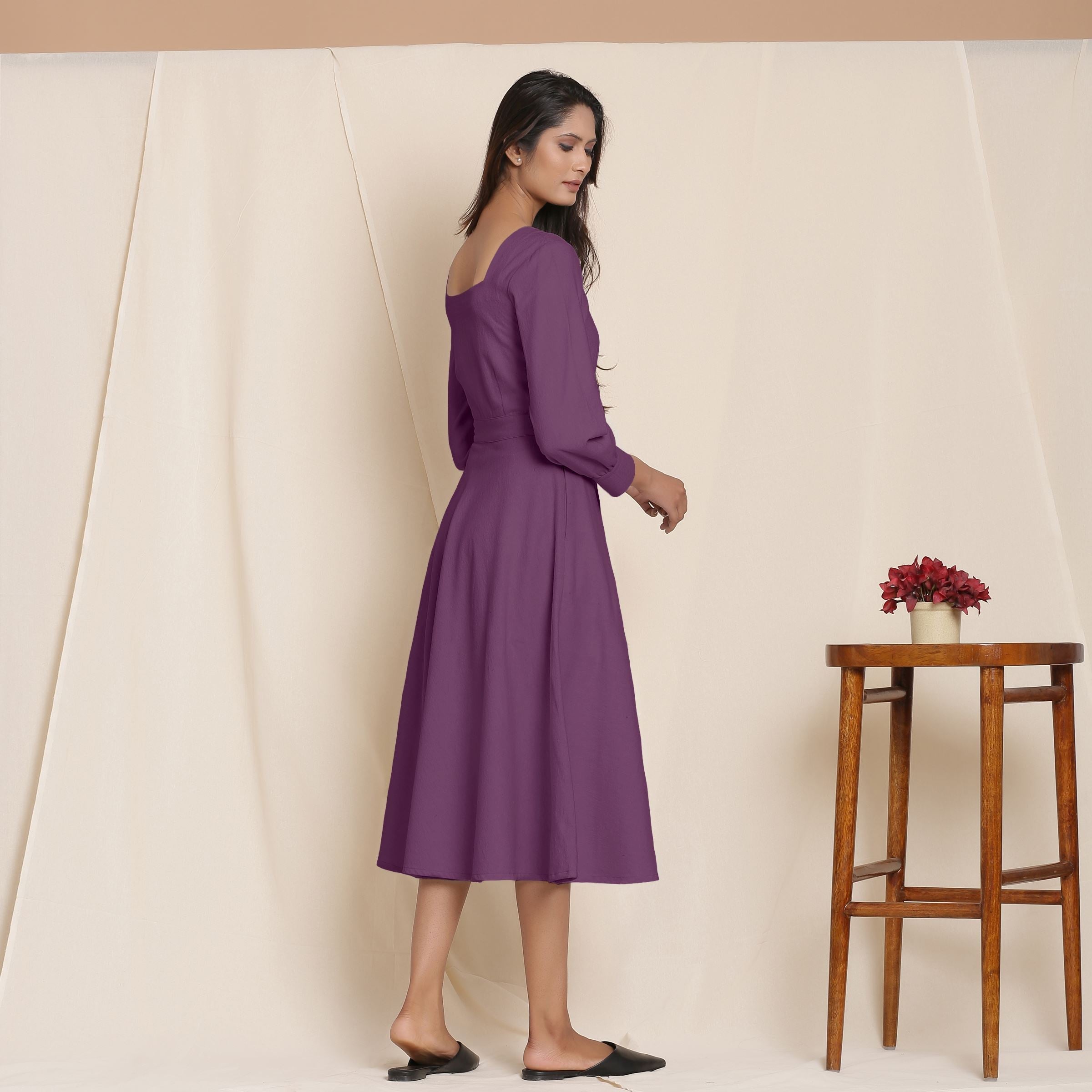 Right View of a Model wearing Warm Flannel Wine and Flare Dress