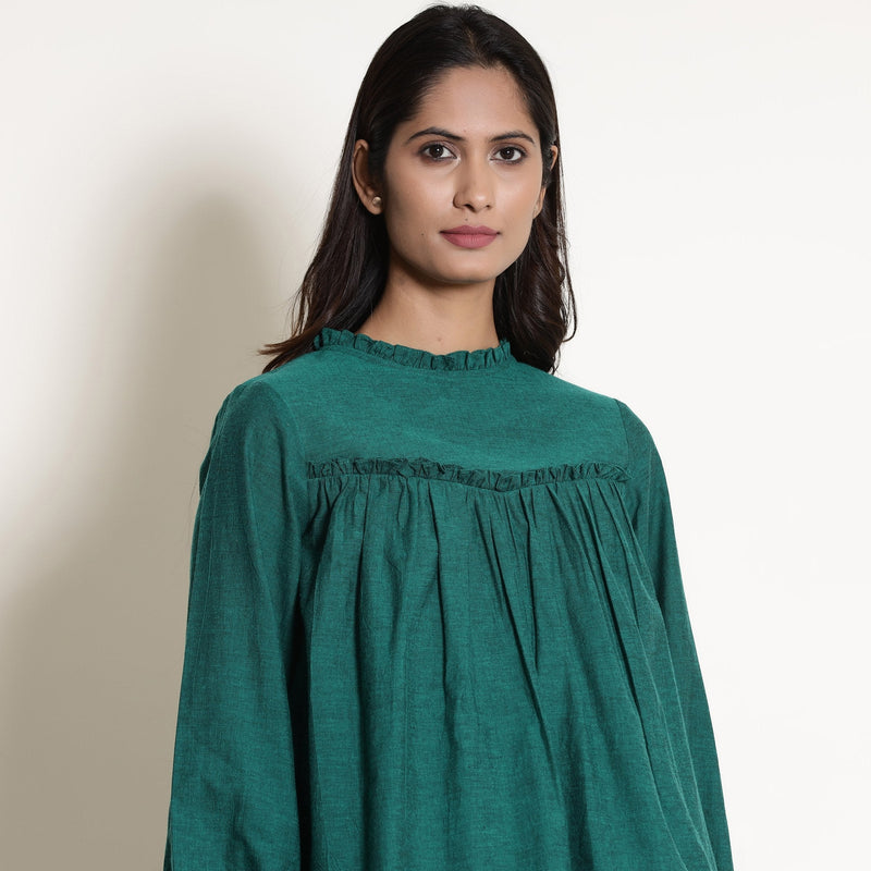 Front Detail of a Model wearing Green Warm Cotton Frilled Gathered Yoke Top
