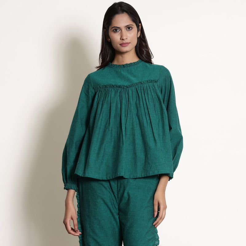Front View of a Model wearing Green Warm Cotton Frilled Gathered Yoke Top